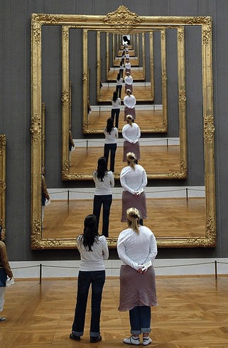 two mirrors facing each other